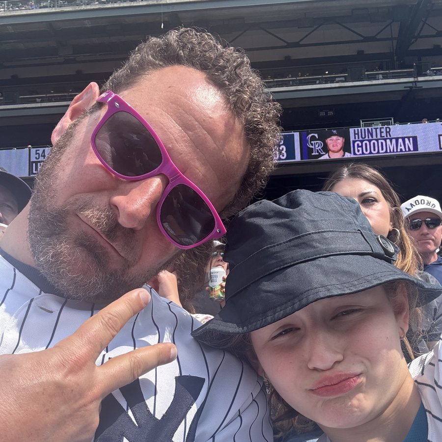 Dave and his daughter at a baseball game